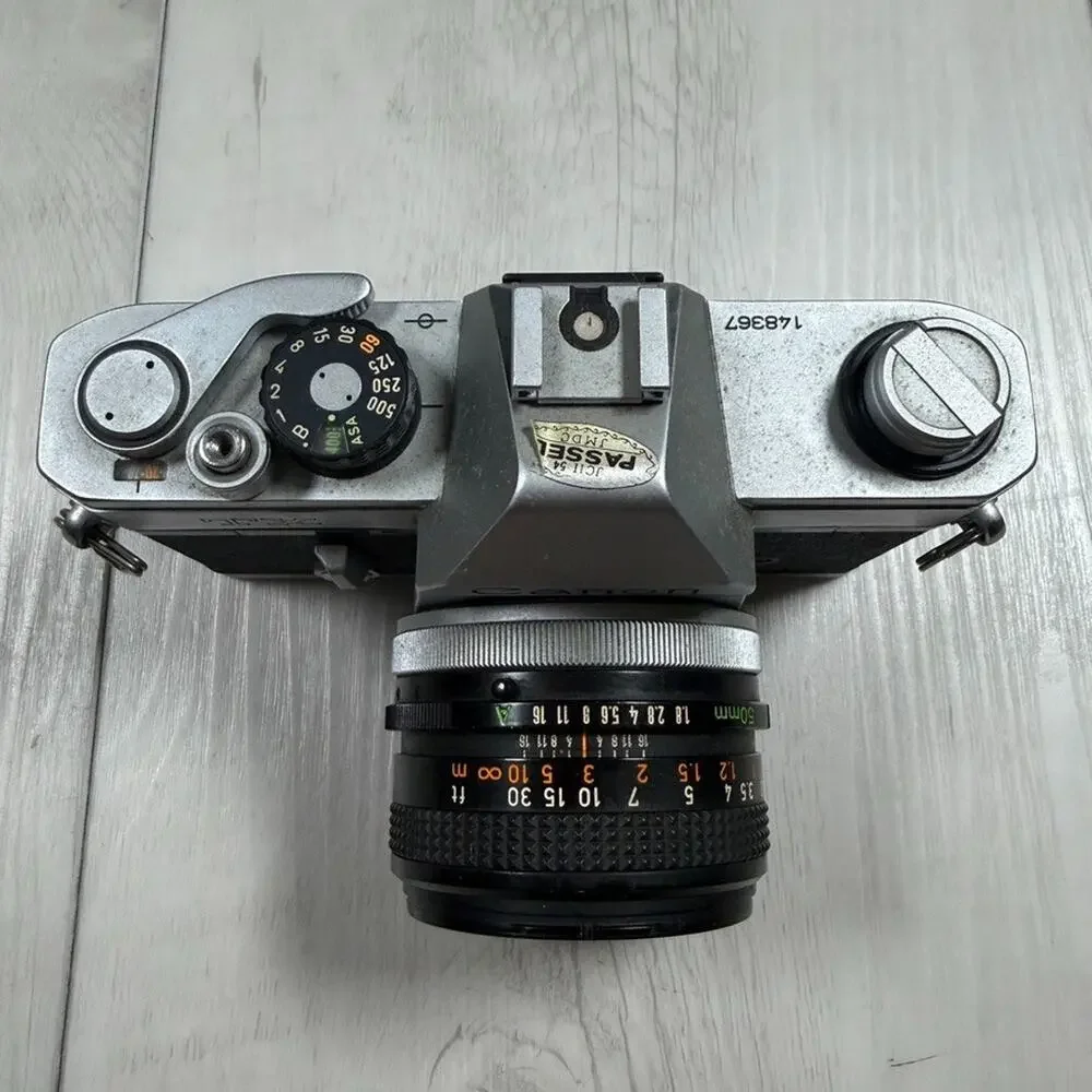 Canon TX 35mm SLR Film Camera with Canon FD 50mm f/1.8 Lens – Parts or Repair
